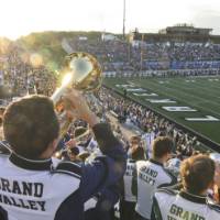 trumpet section playing from the stands at Laker Stadium